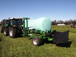 McHale 991T high speed Twin dispenser round bale wrapper